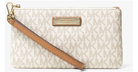 michael michael kors jet set medium logo crossover wristlet|michael kors large wristlet clutch.